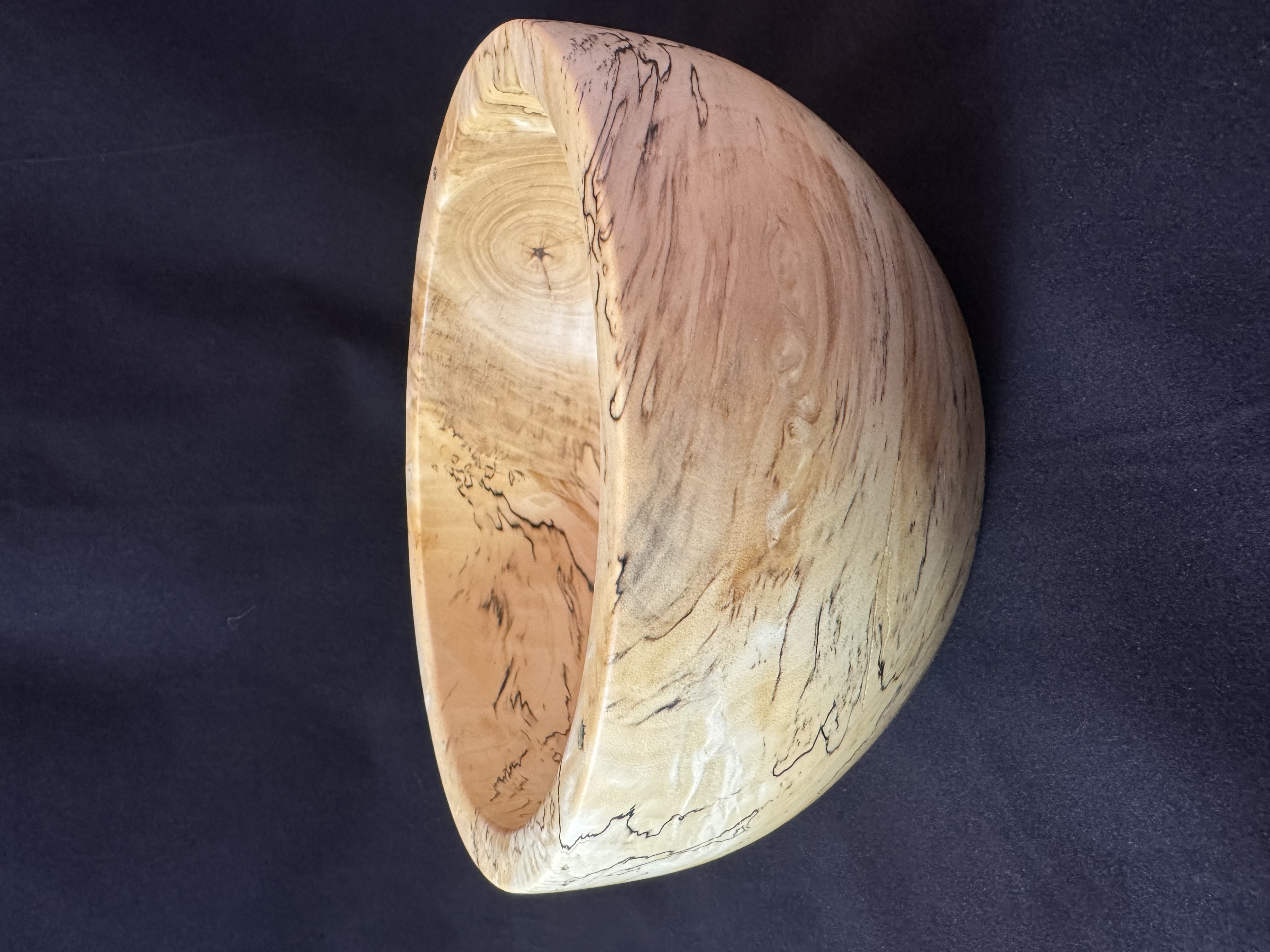 Interior view of small spalted maple bowl with natural zone-line pattern