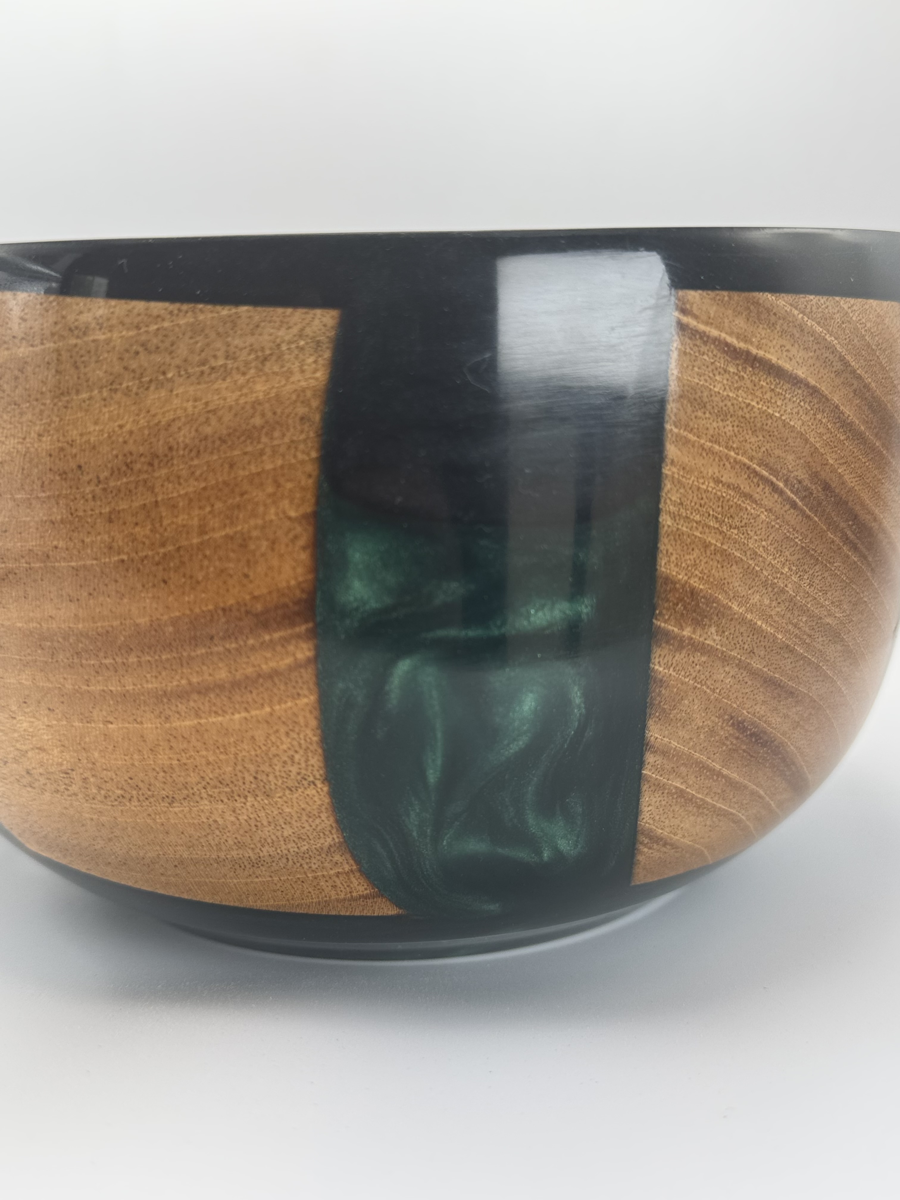 Finished cherry and green resin bowl shown from above